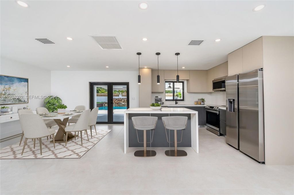 Image 1 of property listing at 9230 SW 183rd Ter, Palmetto Bay, FL 33157