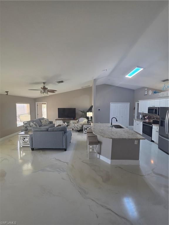 Image 10 of property listing at 410 NW 11th TER, Cape Coral, FL 33993