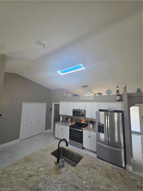 Image 11 of property listing at 410 NW 11th TER, Cape Coral, FL 33993