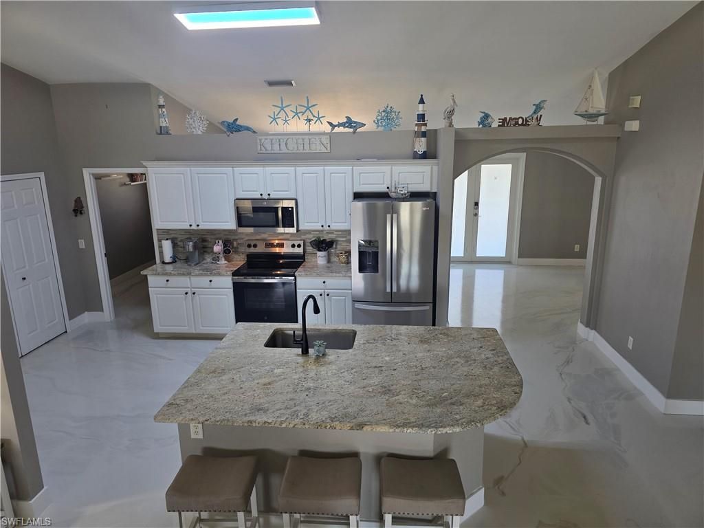 Image 30 of property listing at 410 NW 11th TER, Cape Coral, FL 33993