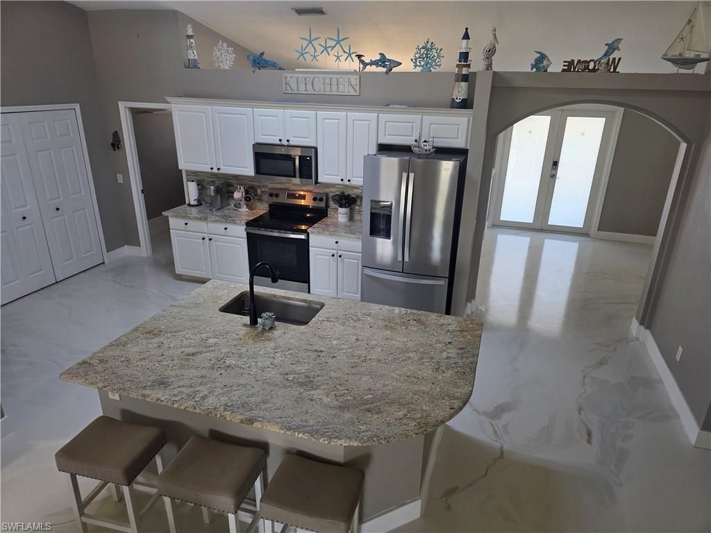 Image 31 of property listing at 410 NW 11th TER, Cape Coral, FL 33993