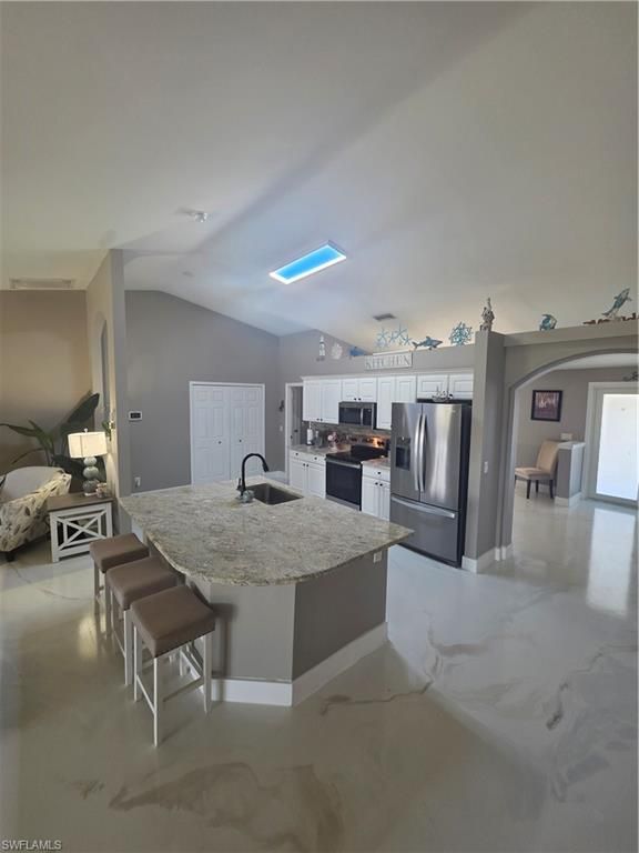 Image 9 of property listing at 410 NW 11th TER, Cape Coral, FL 33993