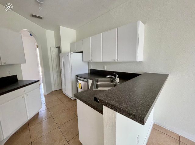 880 Pipers Cay Drive, West Palm Beach, FL 33415