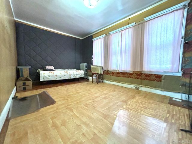 94-24 41st Road, Elmhurst, NY 11373