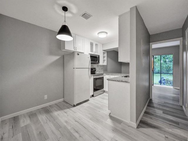 9845 RIVERSIDE Drive 8-28, Coral Springs, FL 33071