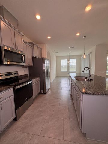 6930 AUDOBON OSPREY COVE, Harmony, FL 34773
