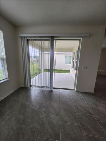 6930 AUDOBON OSPREY COVE, Harmony, FL 34773