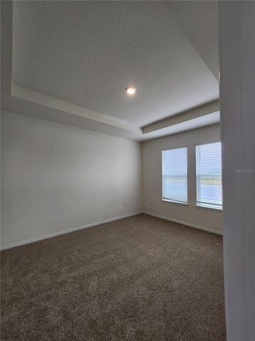 6930 AUDOBON OSPREY COVE, Harmony, FL 34773