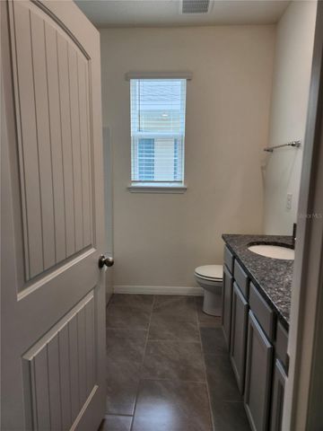 6930 AUDOBON OSPREY COVE, Harmony, FL 34773