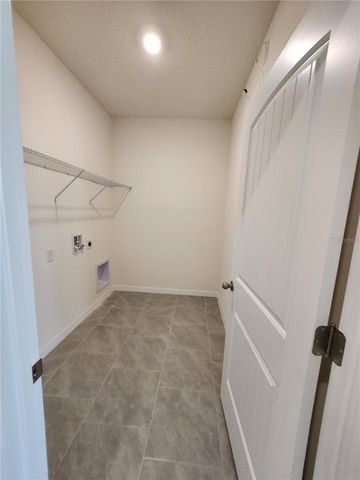 6930 AUDOBON OSPREY COVE, Harmony, FL 34773