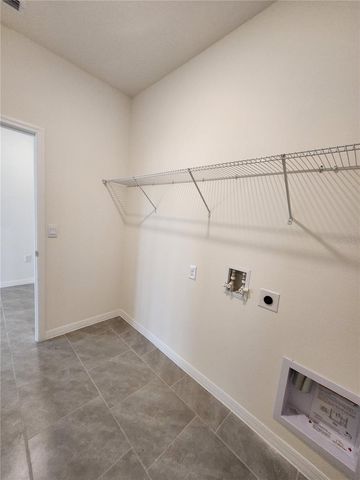 6930 AUDOBON OSPREY COVE, Harmony, FL 34773