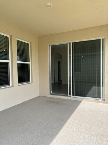 6930 AUDOBON OSPREY COVE, Harmony, FL 34773