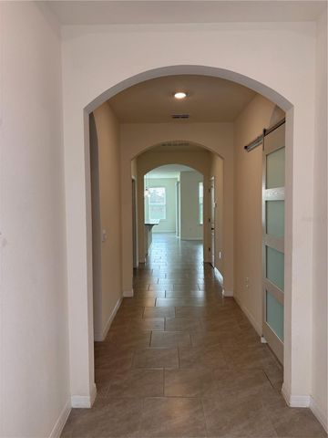 6930 AUDOBON OSPREY COVE, Harmony, FL 34773