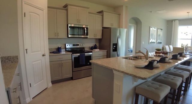 6930 AUDOBON OSPREY COVE, Harmony, FL 34773