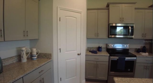6930 AUDOBON OSPREY COVE, Harmony, FL 34773