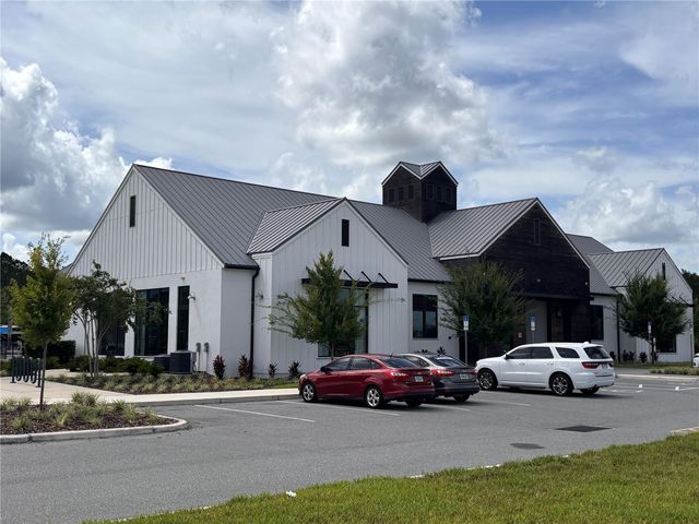 6930 AUDOBON OSPREY COVE, Harmony, FL 34773