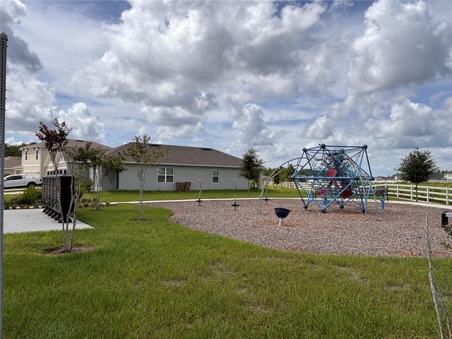 6930 AUDOBON OSPREY COVE, Harmony, FL 34773