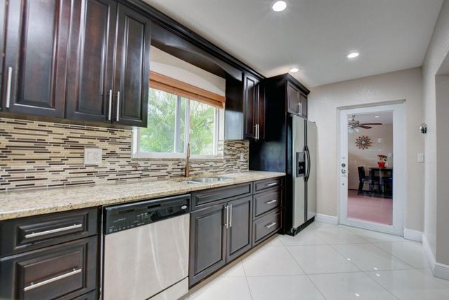 1371 Woodcrest Road W, West Palm Beach, FL 33417