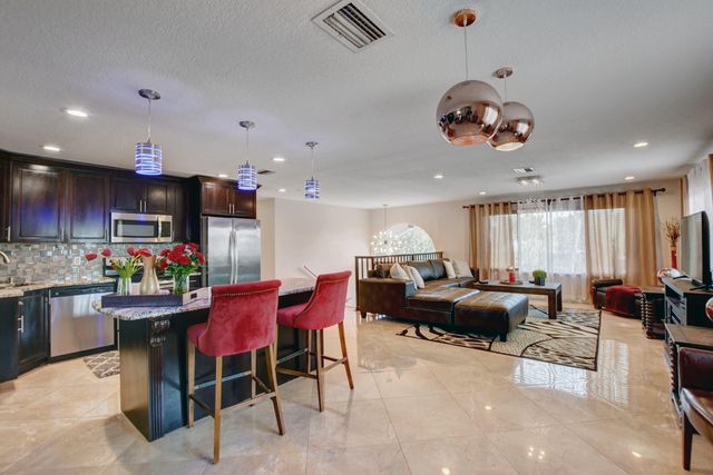 1371 Woodcrest Road W, West Palm Beach, FL 33417