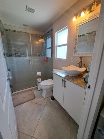 1371 Woodcrest Road W, West Palm Beach, FL 33417