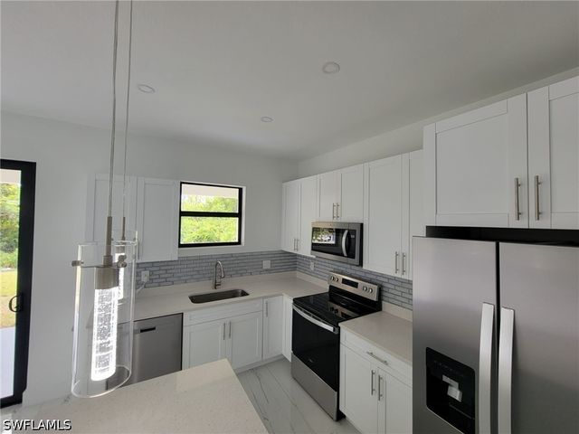 886 Milwaukee BLVD, Lehigh Acres, FL 33974