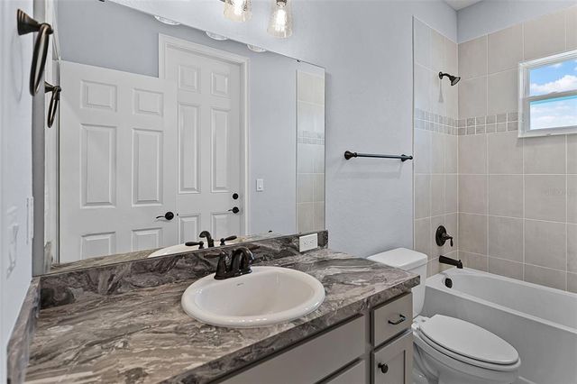 303 TRAVELERS CREEK DRIVE, Auburndale, FL 33823