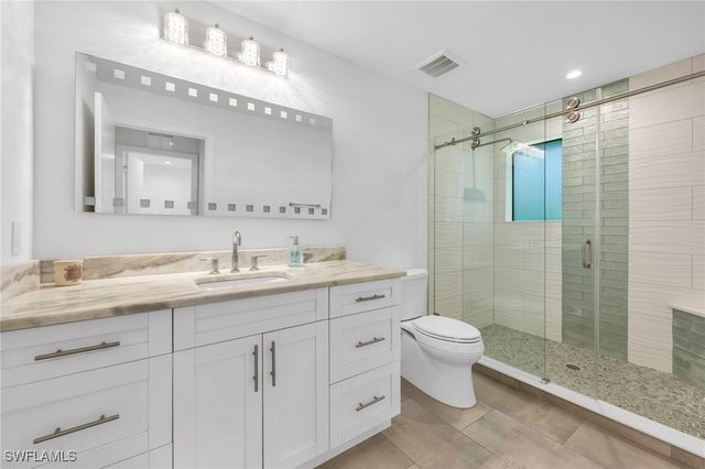 6659 Livingston Woods LN, Naples, FL 34109