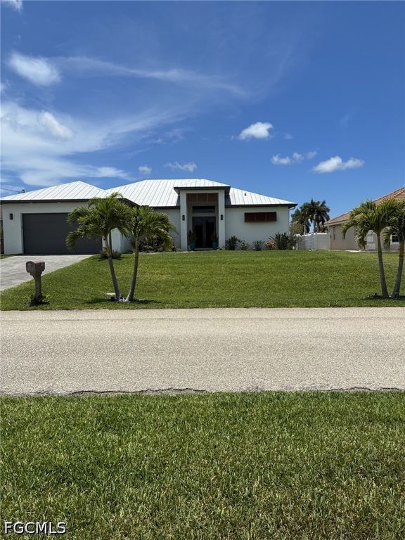 Image 1 of property listing at 1120 NW 42nd PL, Cape Coral, FL 33993