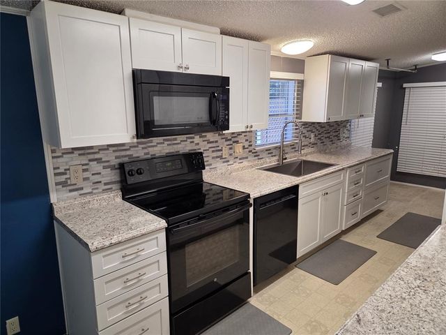 9129 WOOD TERRACE DRIVE, Tampa, FL 33637