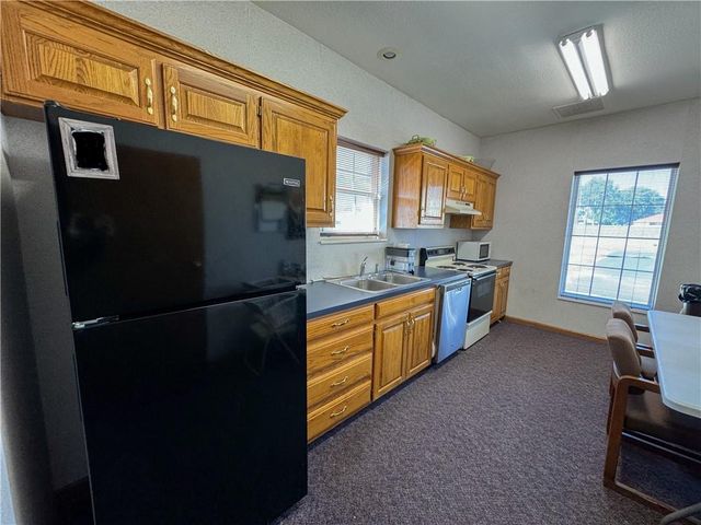 401 W Foxwood Drive, Raymore, MO 64083