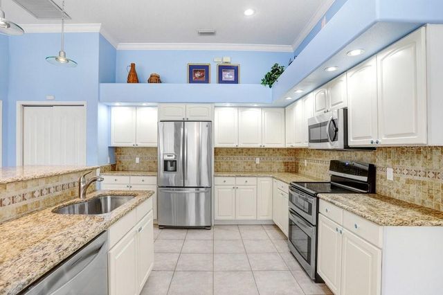 12009 BREWSTER DRIVE, Tampa, FL 33626