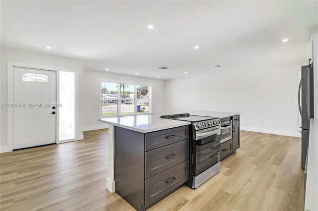 404 Highwood Circle, Jupiter, FL 33458