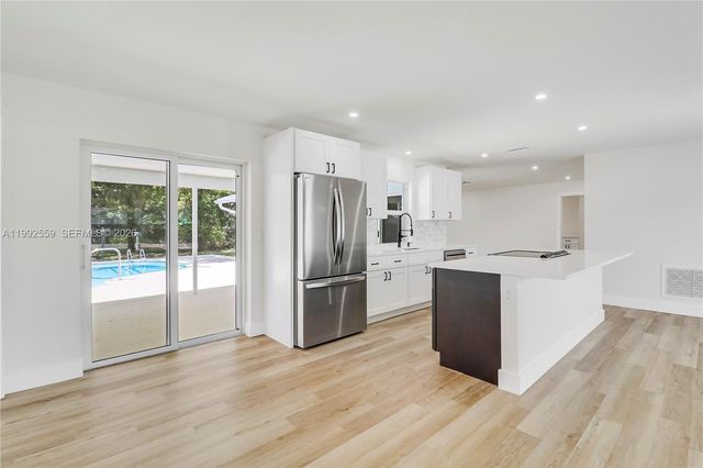 404 Highwood Circle, Jupiter, FL 33458