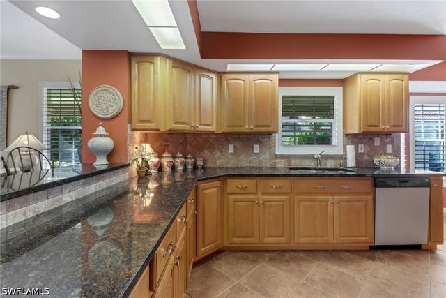11745 Quail Village Way, Naples, FL 34119
