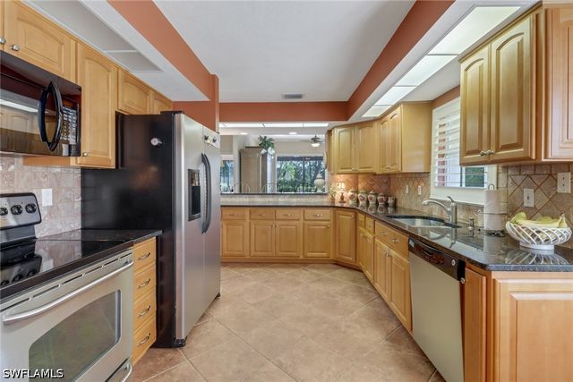 11745 Quail Village Way, Naples, FL 34119