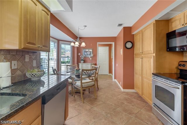 11745 Quail Village Way, Naples, FL 34119