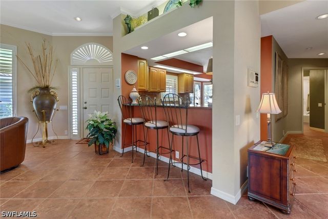 11745 Quail Village Way, Naples, FL 34119
