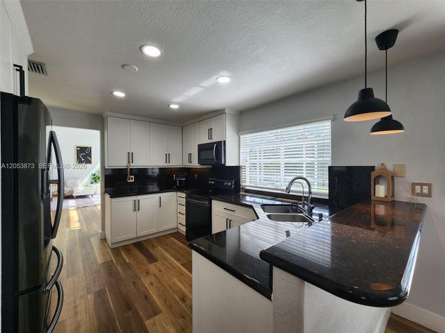 594 Spinnaker, Weston, FL 33326