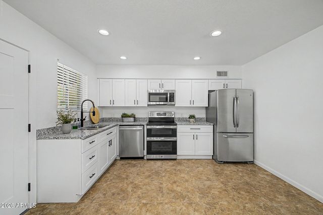 242 E HEATHER Avenue, Gilbert, AZ 85234