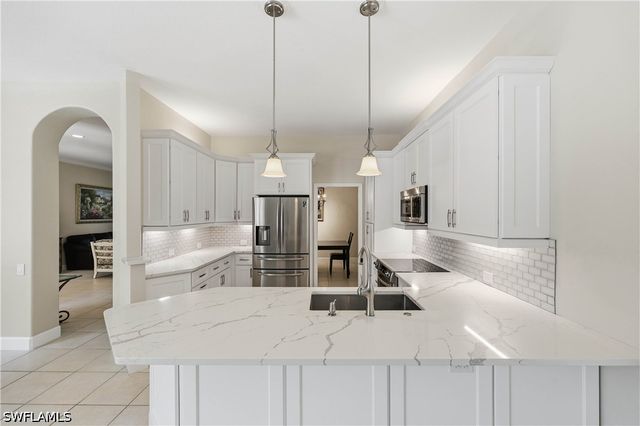 9227 Troon Lakes DR, Naples, FL 34109