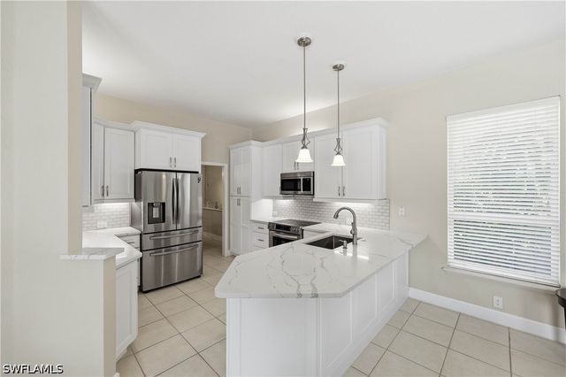 9227 Troon Lakes DR, Naples, FL 34109