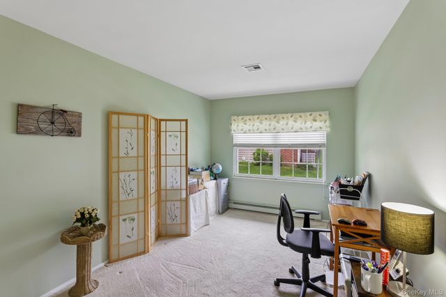 196 Newcastle Court C, Ridge, NY 11961