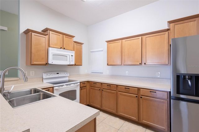 8022 ALAMOSA WOOD AVENUE, Ruskin, FL 33573