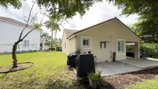 1596 Canary Island Dr, Weston, FL 33327
