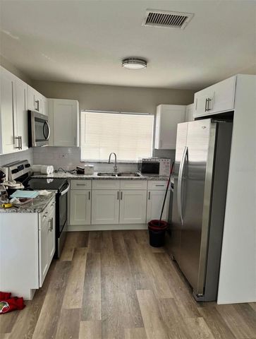 6809 N GUNLOCK AVENUE, Tampa, FL 33614