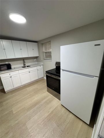 6809 N GUNLOCK AVENUE, Tampa, FL 33614