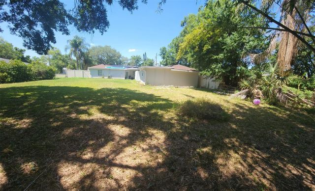 6809 N GUNLOCK AVENUE, Tampa, FL 33614