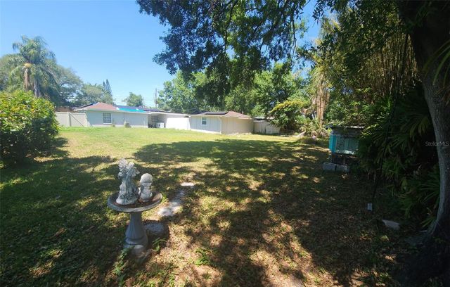 6809 N GUNLOCK AVENUE, Tampa, FL 33614