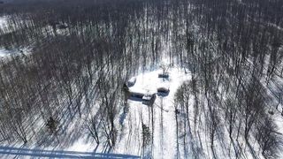 5884 Scholl Road, Mancelona, MI 49659