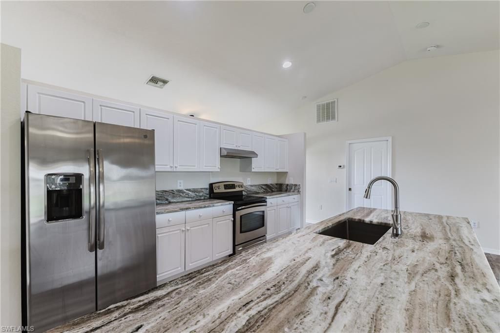 Image 11 of property listing at 408 NE 25th ST, Cape Coral, FL 33909